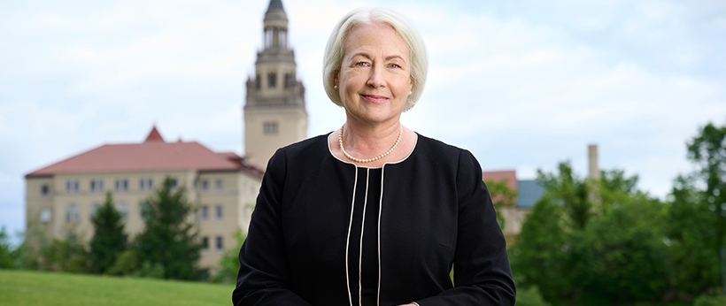 President Christina Clark with Providence Heights in background