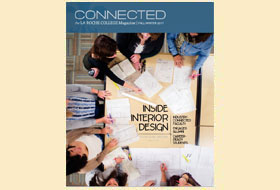 The cover of the fall/winter 2017 issue of the La Roche magazine. A masthead titled Connected appears in blue. The cover photo is a shot from above focusing on a group of interior design students looking at blueprints on a table.