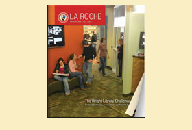 The cover of the Fall 2008 issue of the La Roche magazine. The cover photo shows students together in the design studio area in Wright Library.